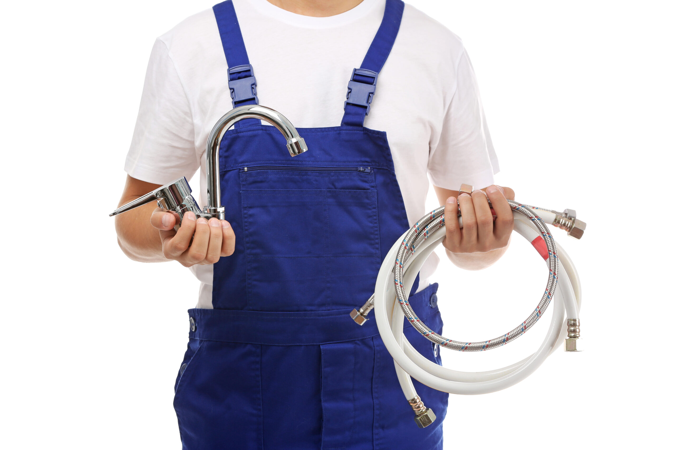 Young handsome plumber with flexible hose and tap on white background